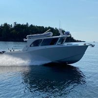 Walker Custom Aluminum Boats logo